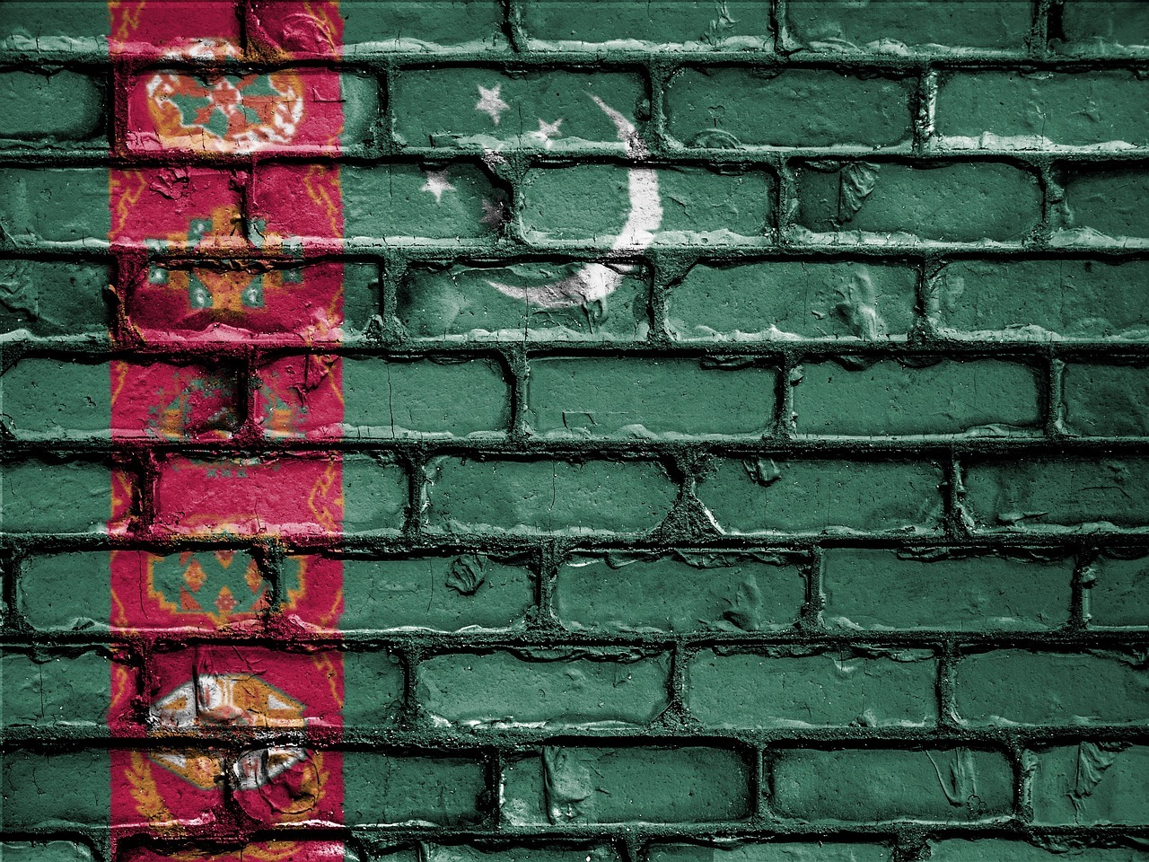 Turkmenistan flag painted onto a print wall